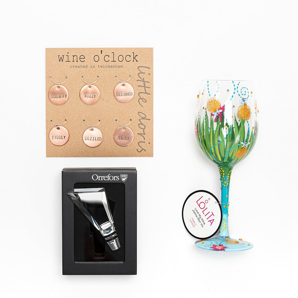 A beautiful gift for anyone who loves hand painted glassware and artisan gifts.  This wine lovers gift box has it all.  A hand painted Lolita glass, hand-made wine charms and an elegant cut glass wine stopper.  All you need is your favourite bottle of wine.