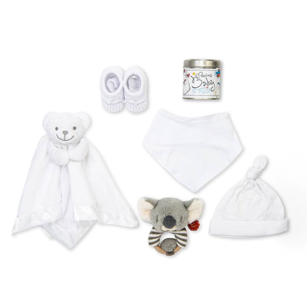 A beautiful unisex new baby celebration gift box with booties, bib and hat along with a comforter and scented candle.
