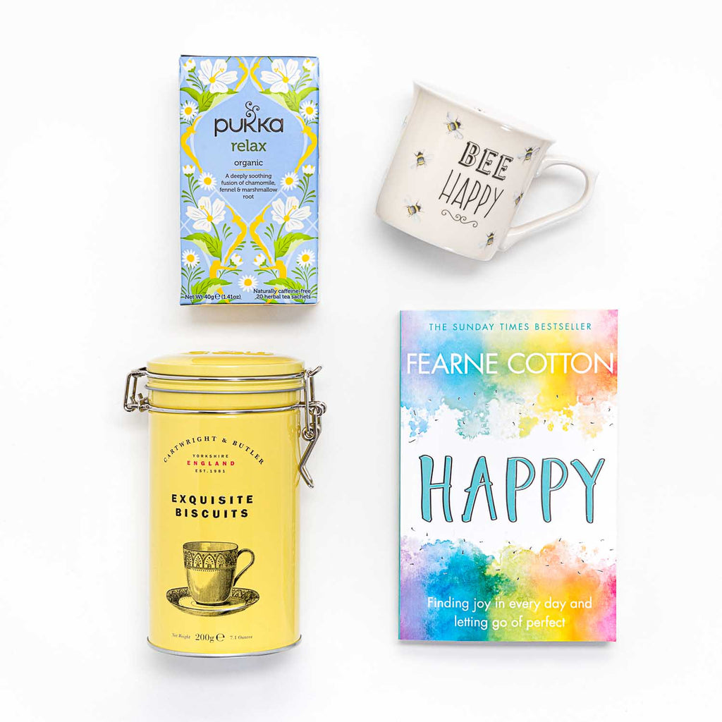 Make someone Happy with our Thinking of You gift box, The Happy.  Tea, biscuits and cute mug and a good read.  Fearne Cottons bestselling Happy shows us how to find the joy in our lives.  A beautiful gift right on budget. 