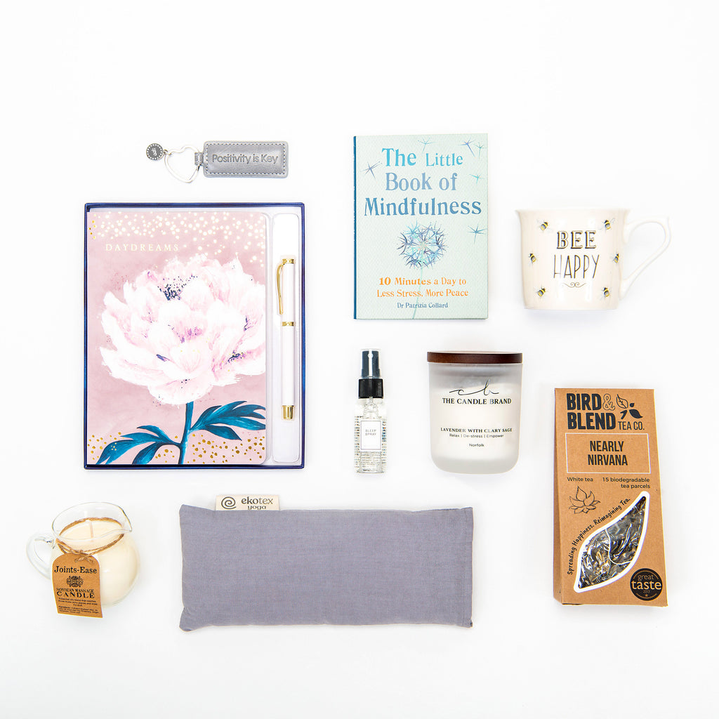 A relaxing gift box to aid mindfulness. Packed with essential gifts with the sole purpose of aiding peace.  A scented eye pillow, candle, herbal tea, journal, massage candle and a copy of the Little Book of Mindfulness.  perfect for our busy loved ones.