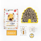 A lovely gardeners gift box with everything bee themed.  A bee hotel to hang outdoors, bee reviver, bee happy mug and a tin of ready to sow seeds to attract our most important garden visitors.