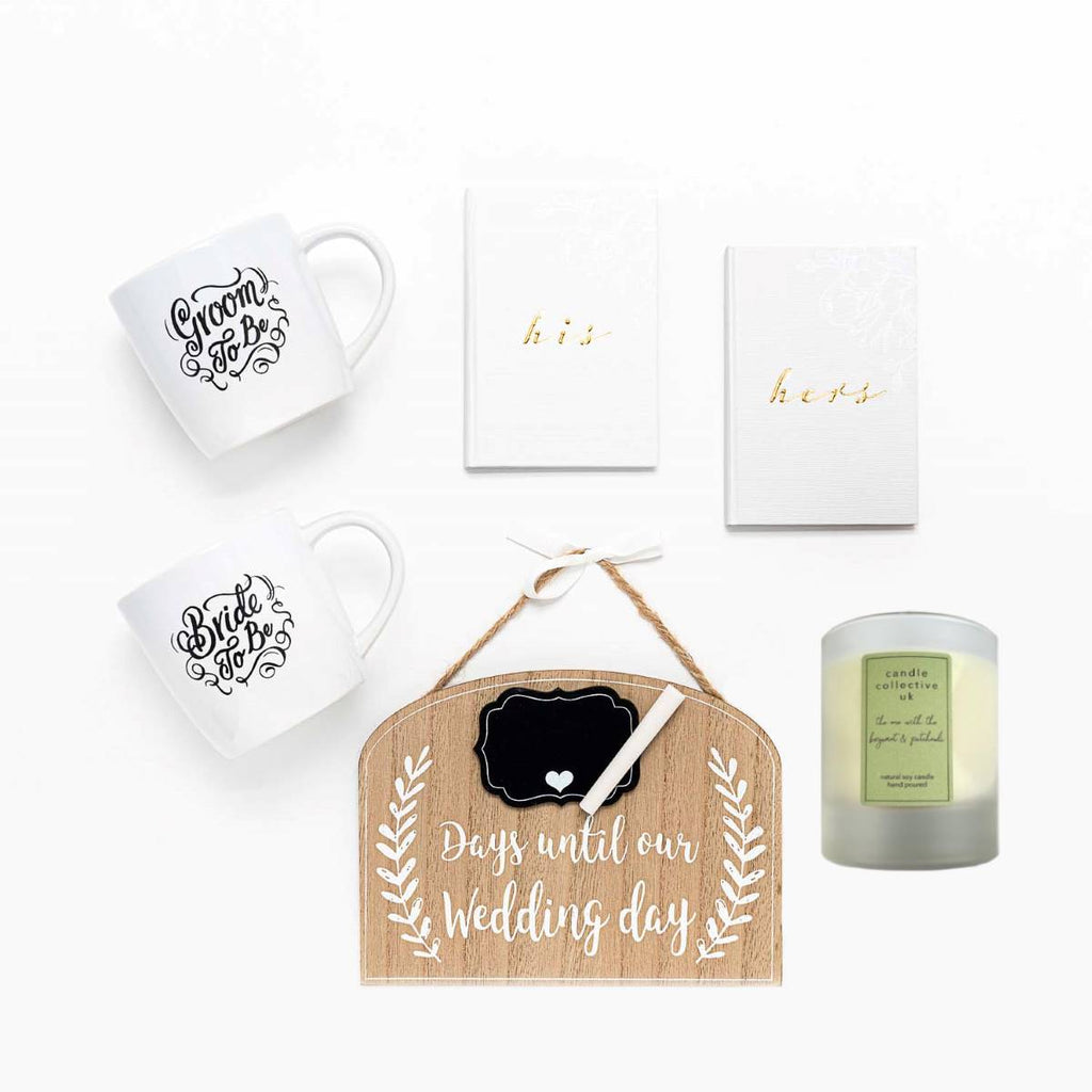 the perfect engagement gift.  Containing Bride and Groom to Be mugs, vow books a countdown chalk board and scented candle.  Same sex mugs are available