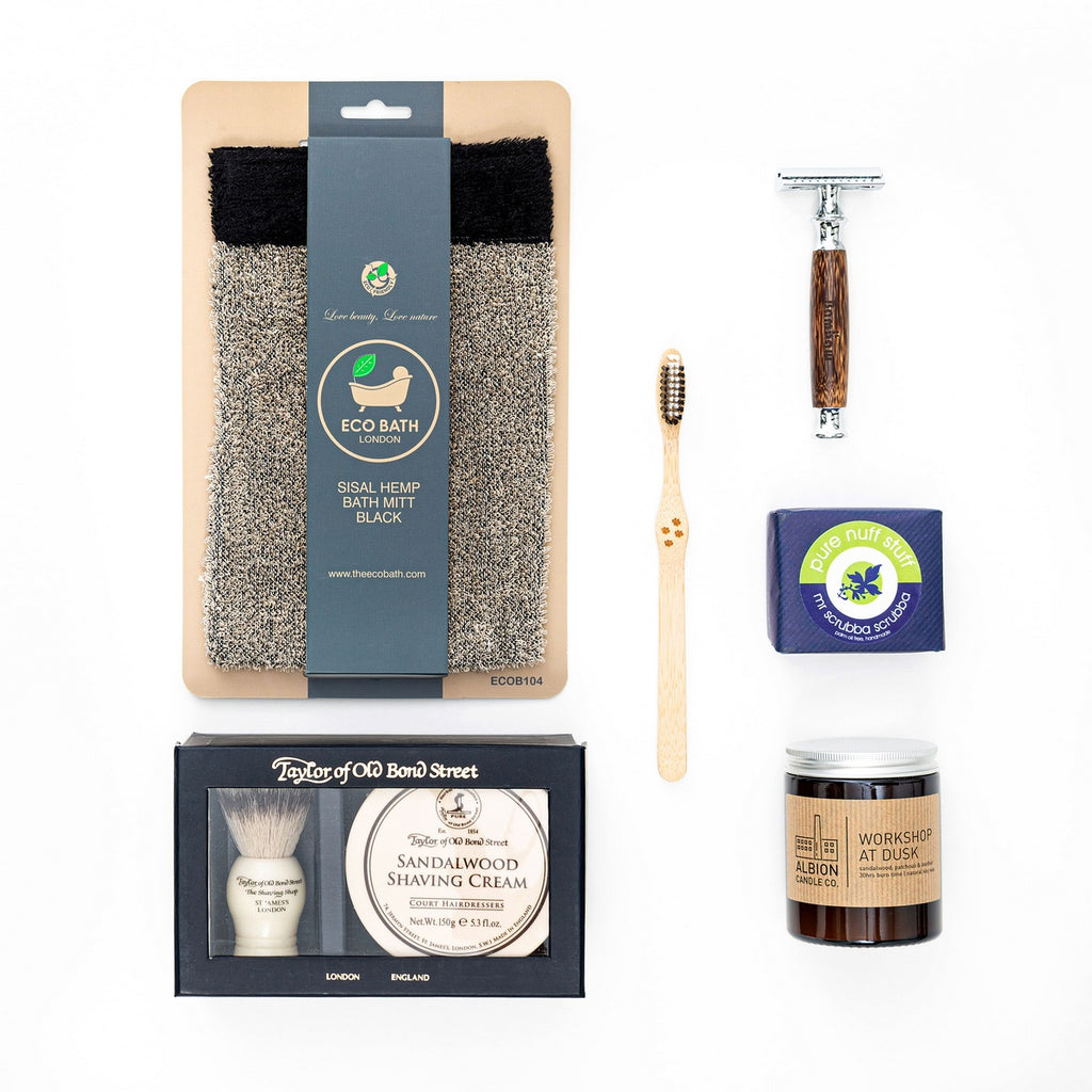 A complete pamper gift for him.  A wet shave gift set, bamboo razor, toothbrush, scrub soap and sisal mitt.  We've also included a candle for him with woody and musky notes.